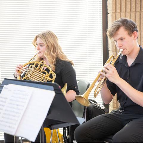 Instrumental students playing during concert